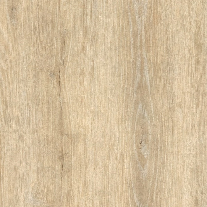 Close-up of a wooden surface with a light brown color and visible grain pattern.