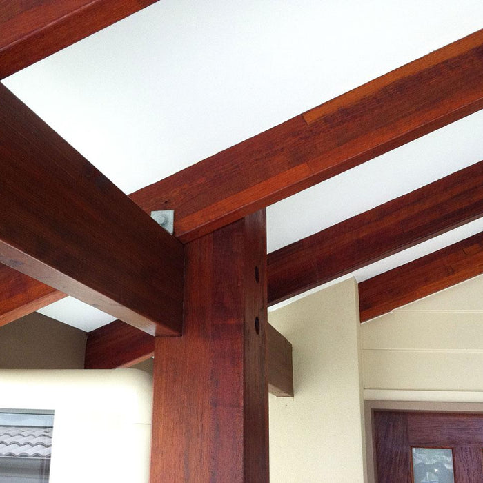 Transform Your Structures with Merbau Laminated Cambered Beams – Unmatched Strength & Style!